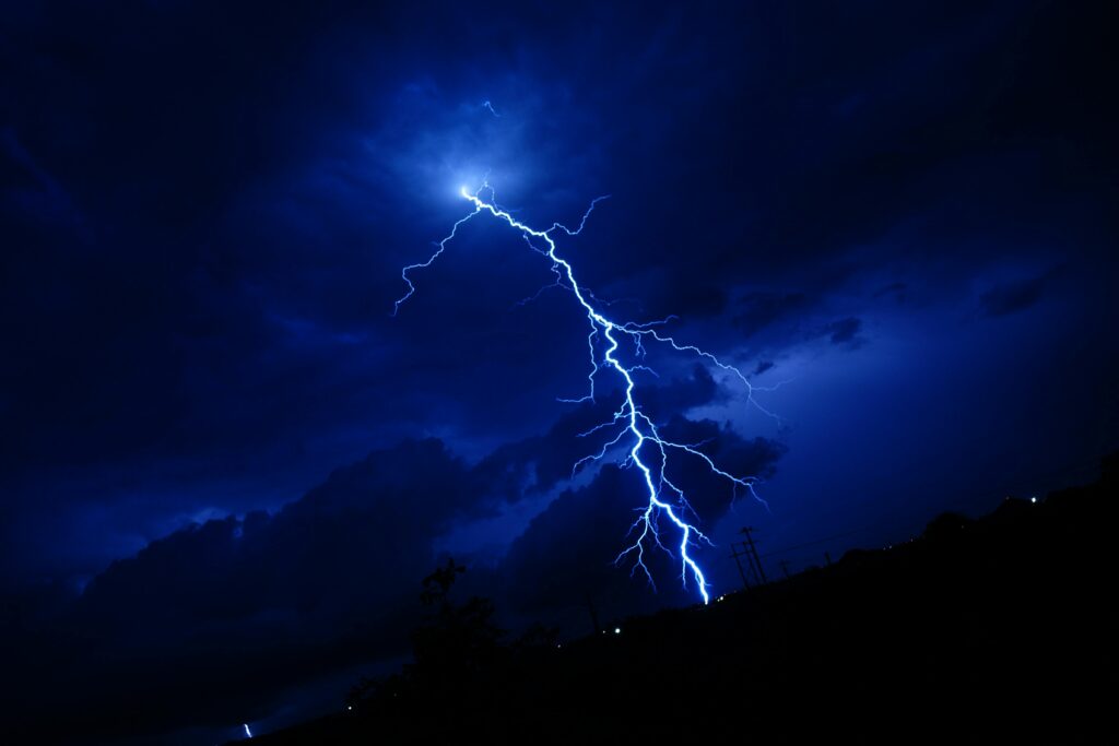 pexels photo 11675529 11675529 A powerful lightning bolt illuminating a dark nighttime sky in Georgetown, Texas.